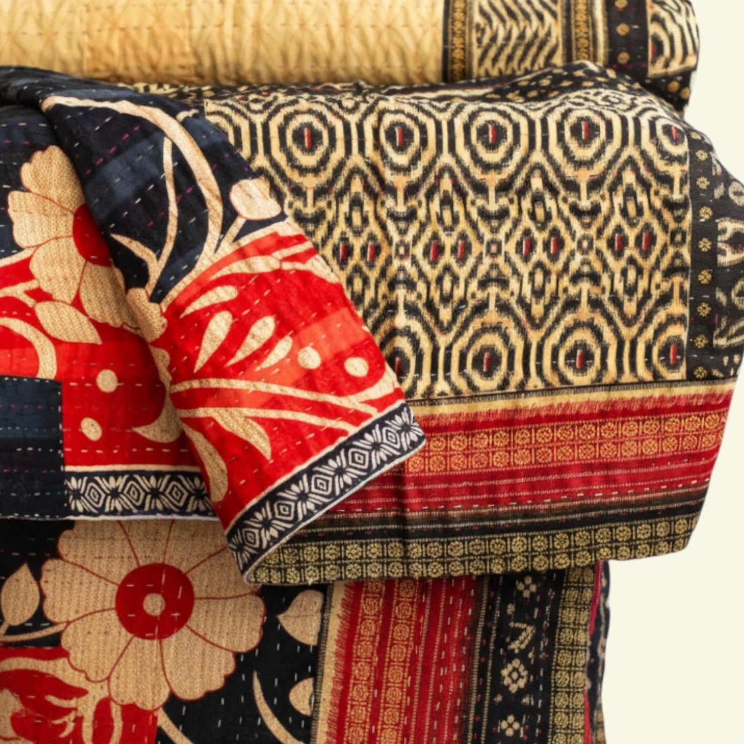 Colorful quilt with intricate patterns on a white background