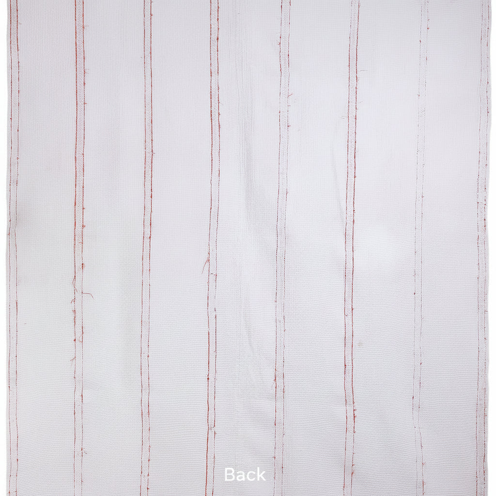 White fabric with red stripes on a white background
