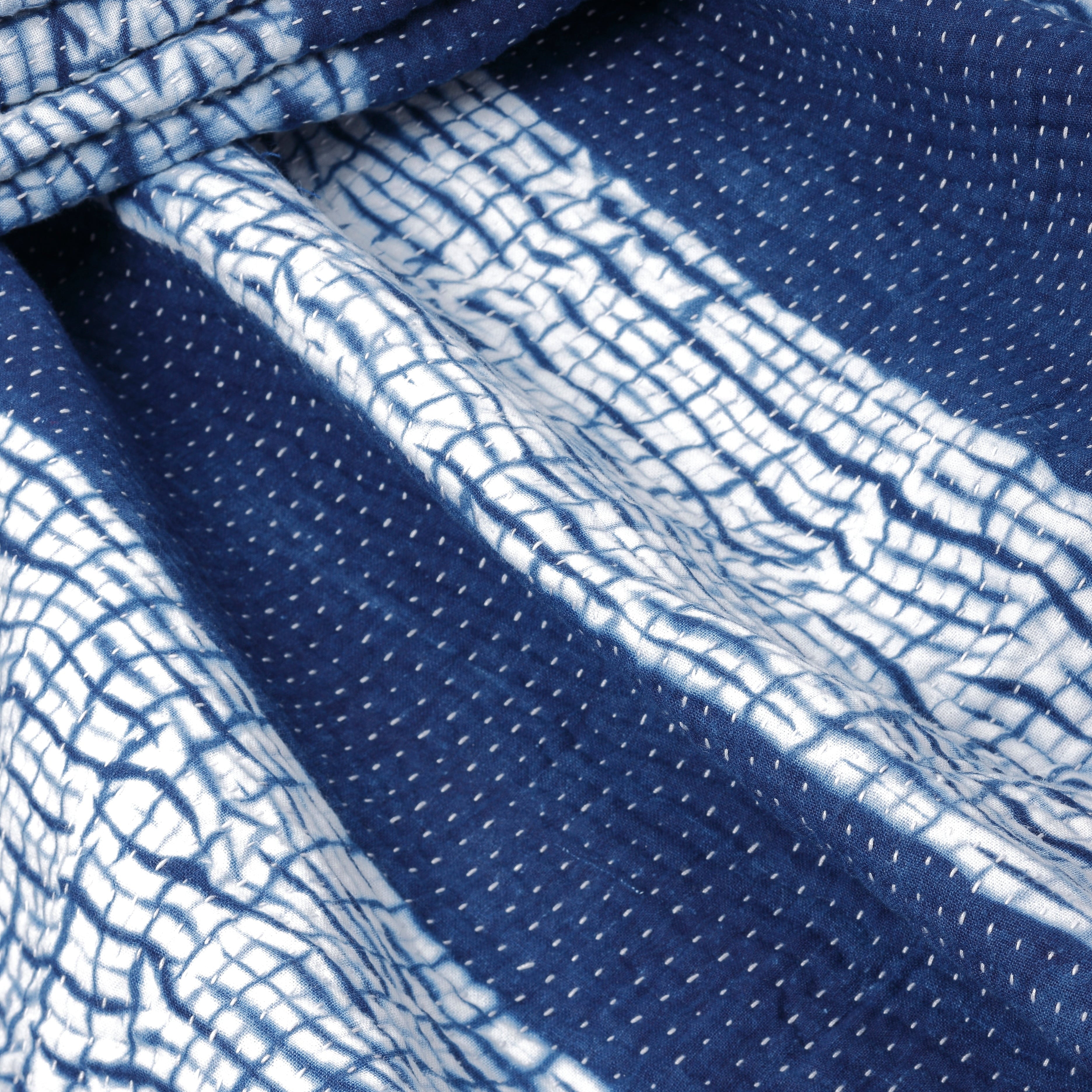 Close-up of blue and white patterned fabric
