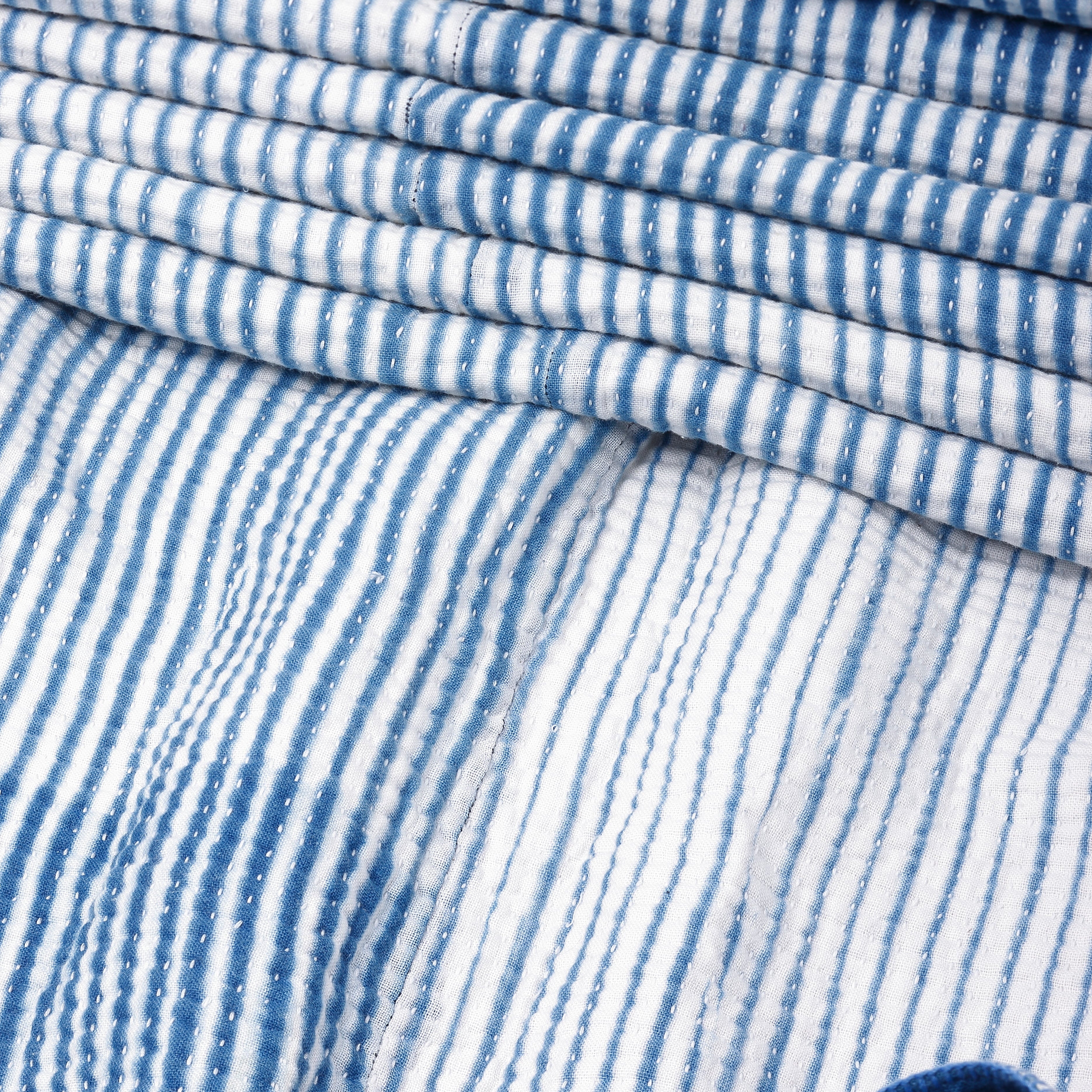 Close-up of blue and white striped fabric
