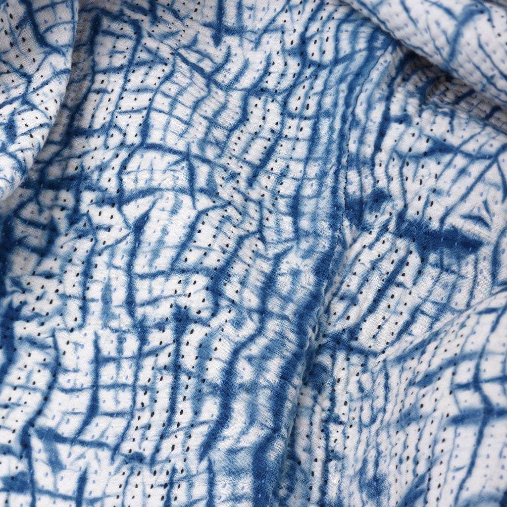 Close-up of fabric with blue and white pattern