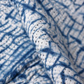 Textured fabric with blue and white pattern